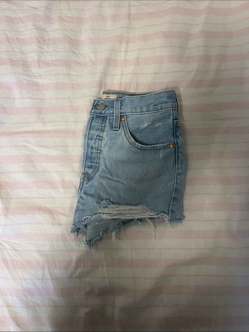 Light blue Levi’s Jean shorts